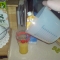 Pouring the whisked egg into the glass aswell