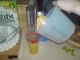 Pouring the whisked egg into the glass aswell