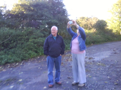 Mum gets the right photo as Dad watches.