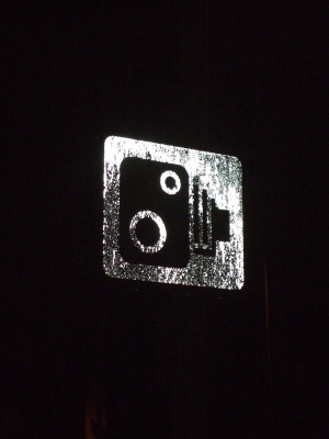 A photo of a sign of a camera