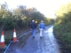 Mum and Dad walk back past cones.