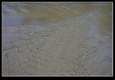 Nice cool water on my toes or shoes rather...