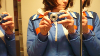 My blue coat and blue camera