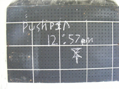 A close up of Daryl's 12:57 inside the general office.