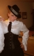 A corset and a fedora. All a woman needs.