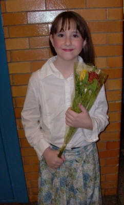 Heather with flowers.JPG