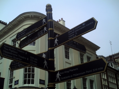 Confusion- the many-tiered signs on New Street, Birmingham