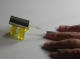 Yellow Team Paints a Nail