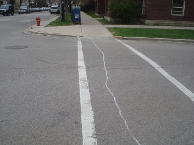 The arrow goes all the way across.