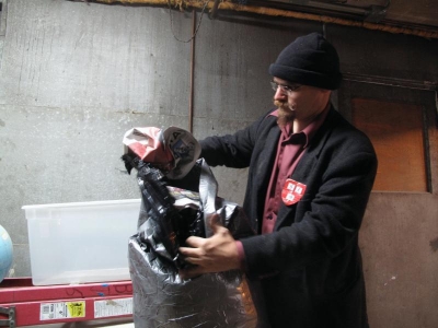 Filling the bag with paper