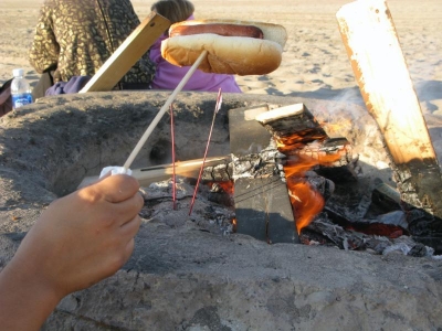Kim demonstrates proper bun toasting technique.