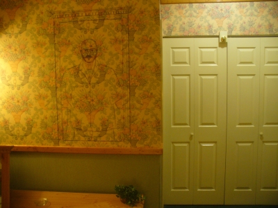 Remove the mirror to find the Secret Wall Tattoo
