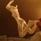 Bex-jumping-off-of-a-cliff-naked statue
