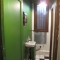 Green skinny bathroom