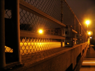 In hiding space beyond bridge rail I duck