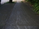 Scratched concrete.