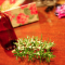 Brown glass and green rosemary.