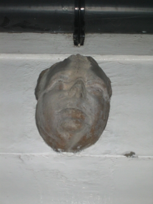 what better above your door than a concrete cast of your face!