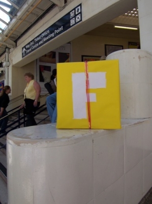 Nothing says present like a suspicious package in a train station