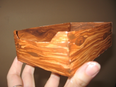 A tiny cardboard box made into The Coffin A tiny cardboard box made into The Coffin