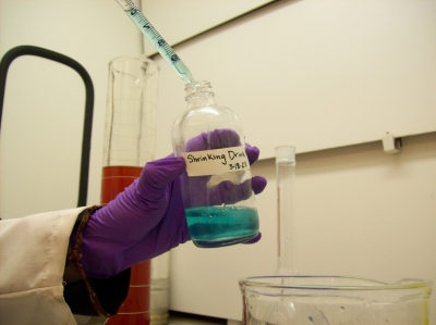 Filling the bottle for consumption.