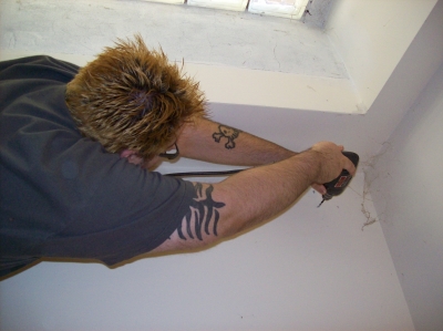 lovesmasher drills holes for installation.  We made way too much noise!