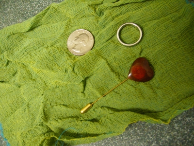 quarter, ring, stick pin