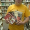 Me holding the books in the library