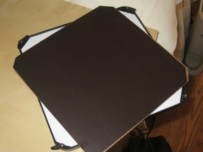 Attached with a magnetic sheet in back...