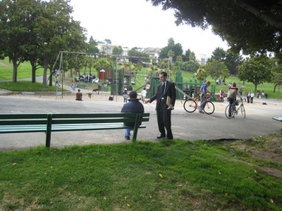 a lonely man at a bench