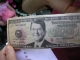 a million dollar bill with Ronald Reagan...