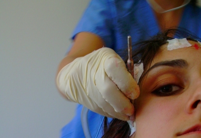 Under the...pokey thing?