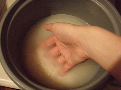 Rinsing rice.