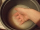 Rinsing rice.