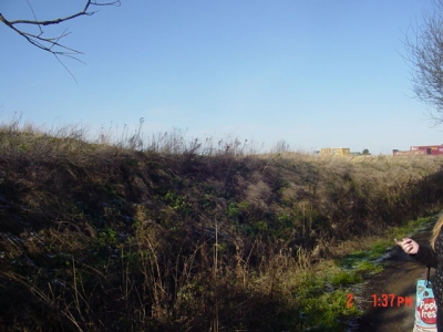 The steep banks loomed upon us.