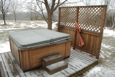 In the hot tub with the lid closed In the hot tub with the lid closed