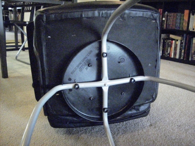 From the underside, attaching hardware instaled to preexisting threaded holes.