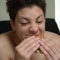Young Female Homo sapien sapiens eating more
