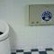 Baby changing station and trashcan