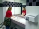 Alice washing her hands at the sink
