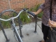 On a bike.