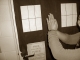 And raised both hands, In prayer to the door.