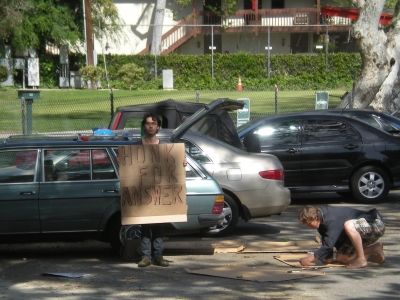 The making of the signs.