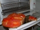 Toasting tomatoes.