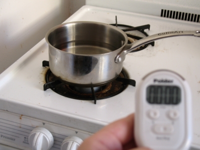 Turn burner on and begin timer