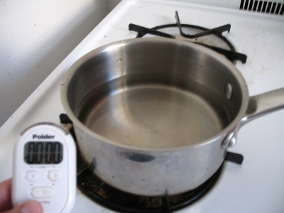 Turn burner on and begin timer