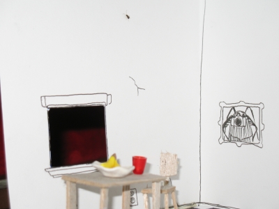 A baby cockroach crawling across the wall!  (Top and Center)