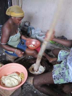 Pounding the fufu