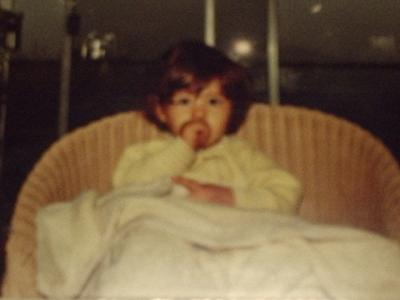 baby crzy bones in her chair w/ binki 