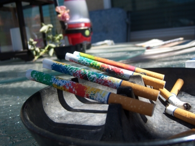Profile of tiny tie-dye tobacco cannons.